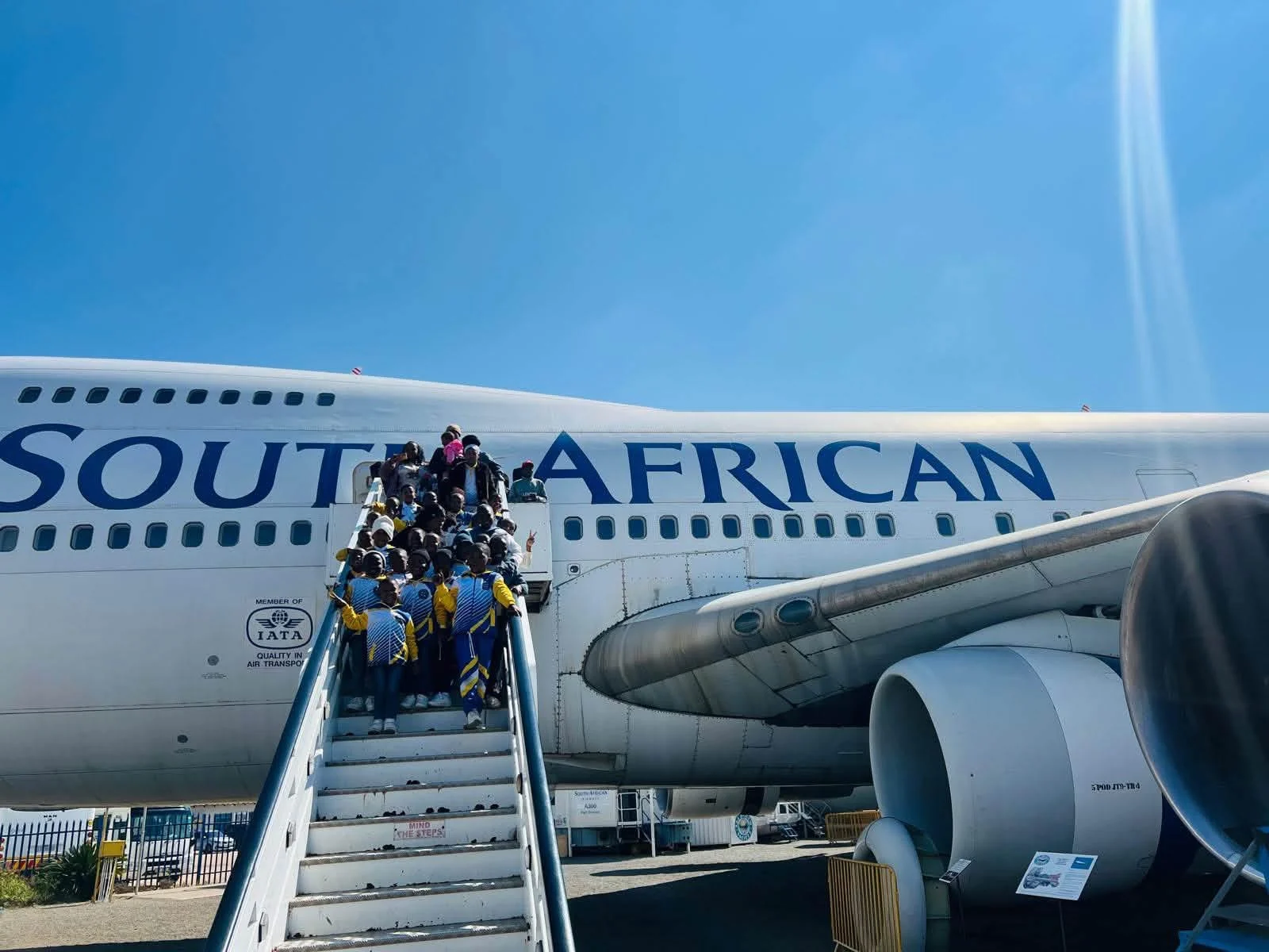 Learners visiting an aircraft on a school outing